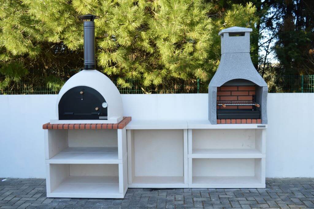 EMBR outdoor kitchen with wood-fired oven and charcoal barbecue