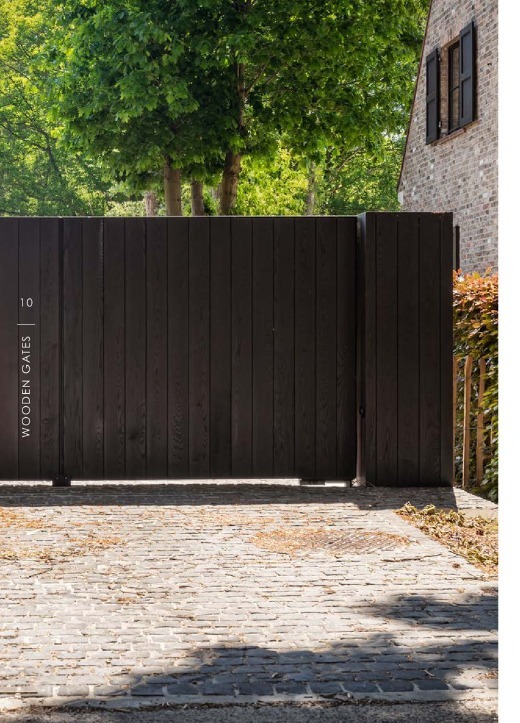 Dark timber sliding gate with aluminium frame