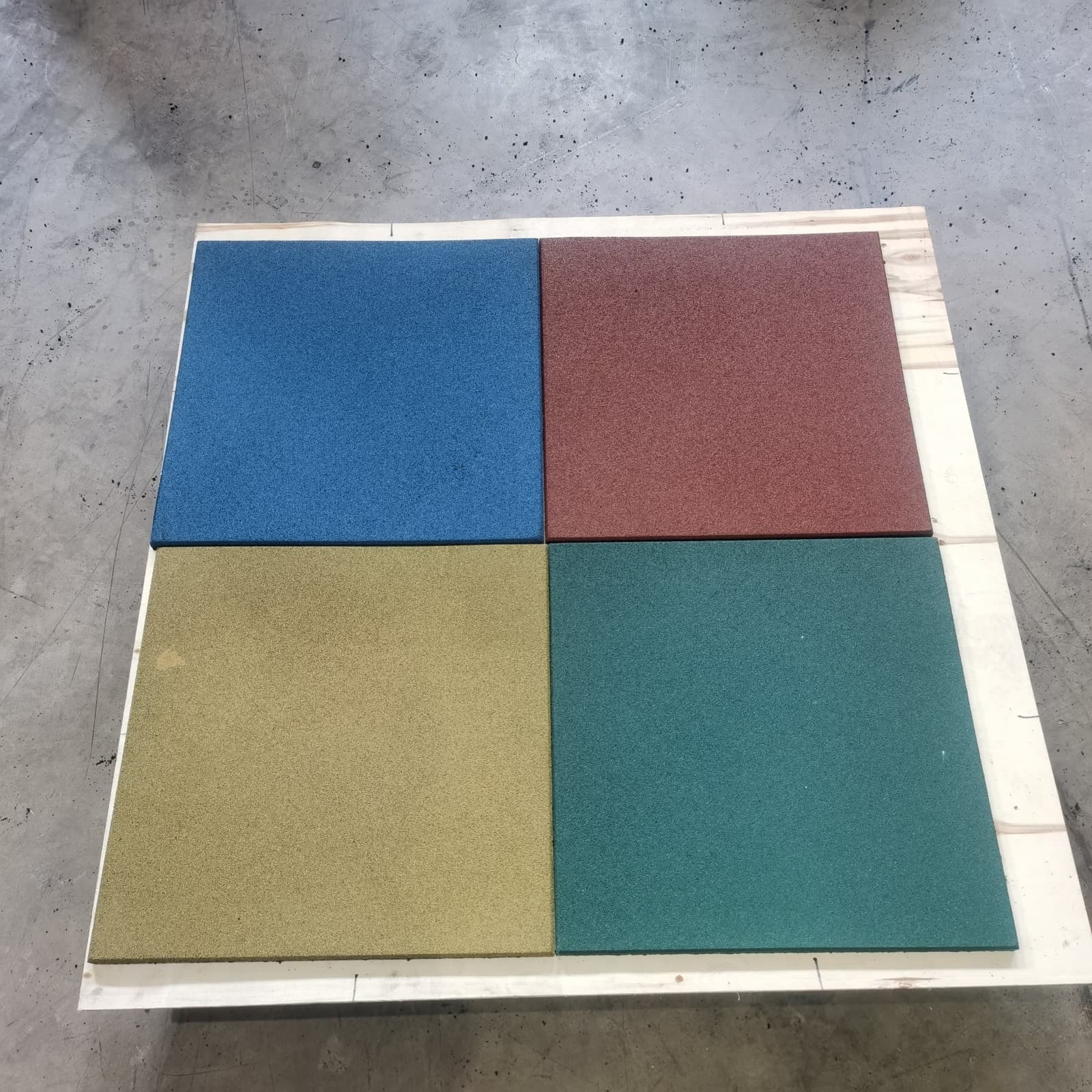 Blue red yellow and green rubber flooring sample tiles