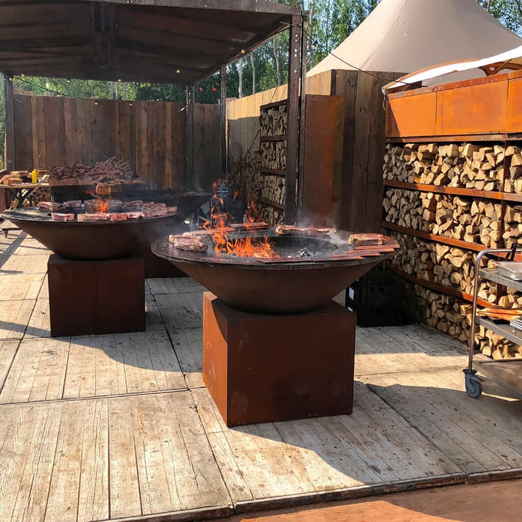 Multiple FJARVIK live-fire grill stations in hospitality service