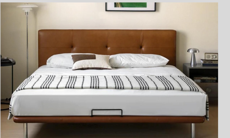 SKELVAR buttoned Mid-Century platform bed in warm brown upholstery