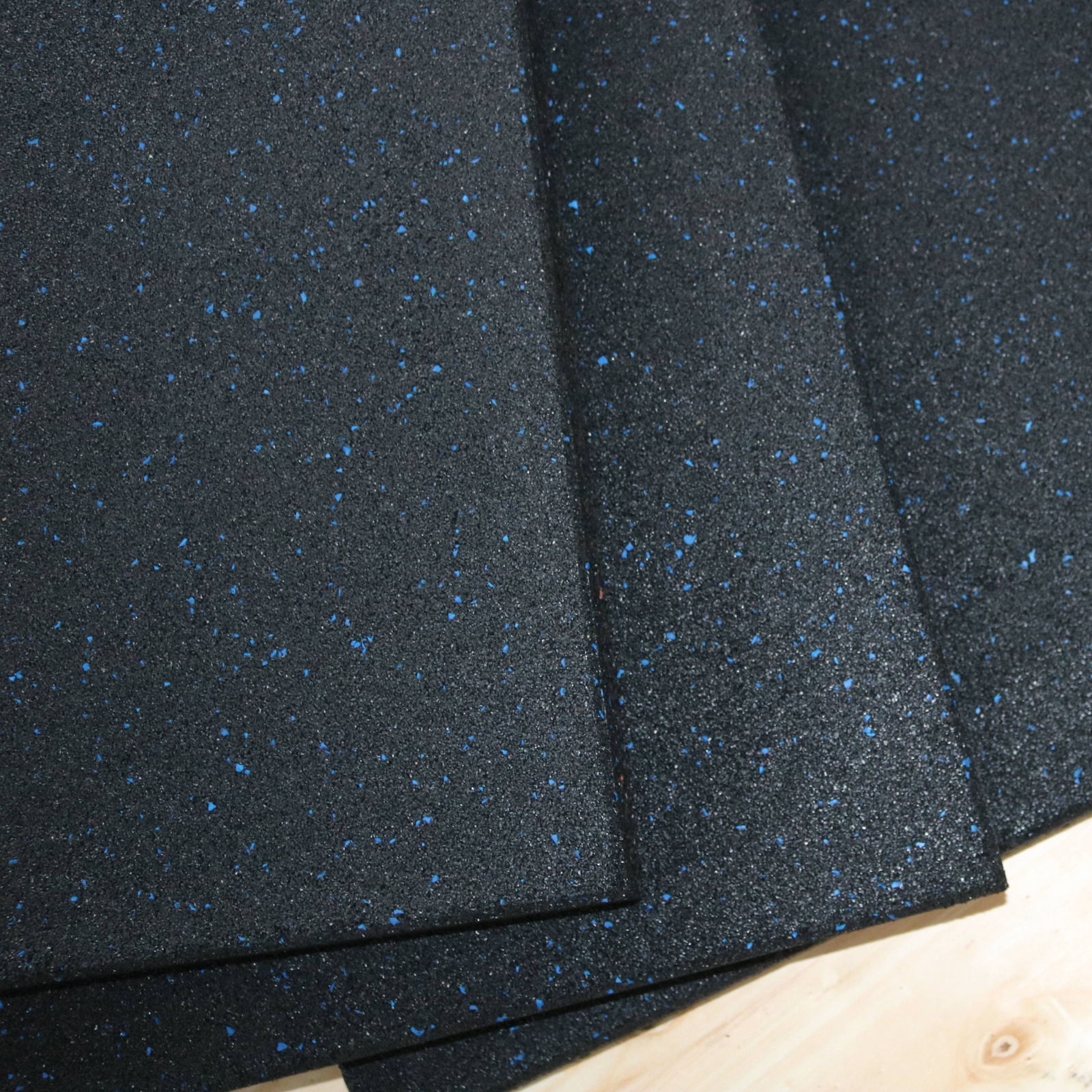 Black rubber gym floor sheets with blue EPDM flecks