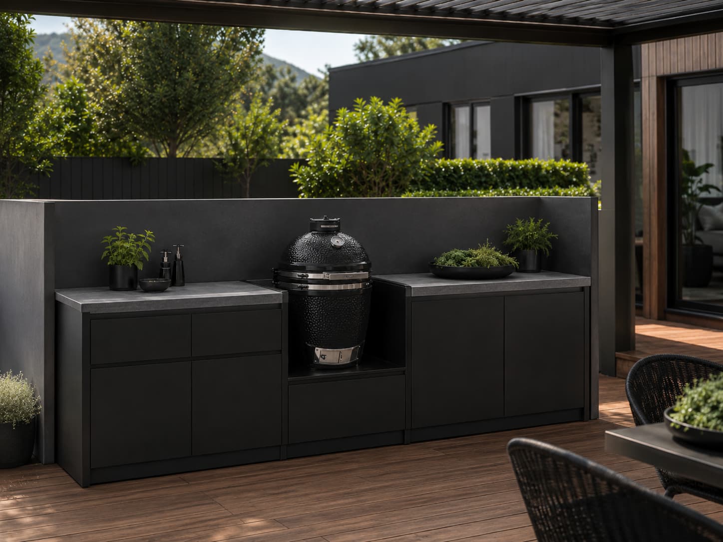 ARVIK kamado grill cabinet integrated into modular outdoor kitchen