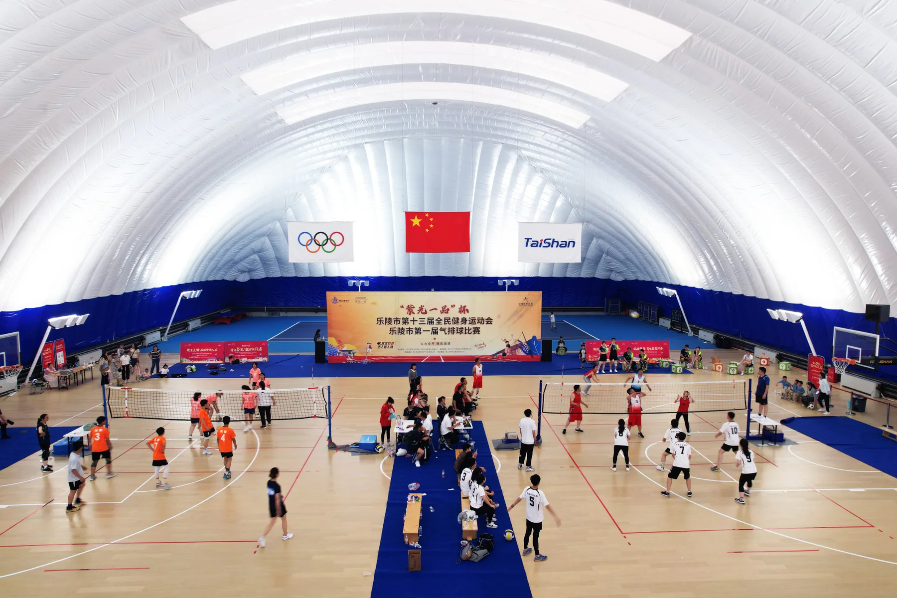 Air-supported sports hall configured for indoor event courts